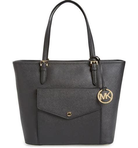 michael kors large jet set snap pocket leather top-handle tote|Michael Kors large travel bag.